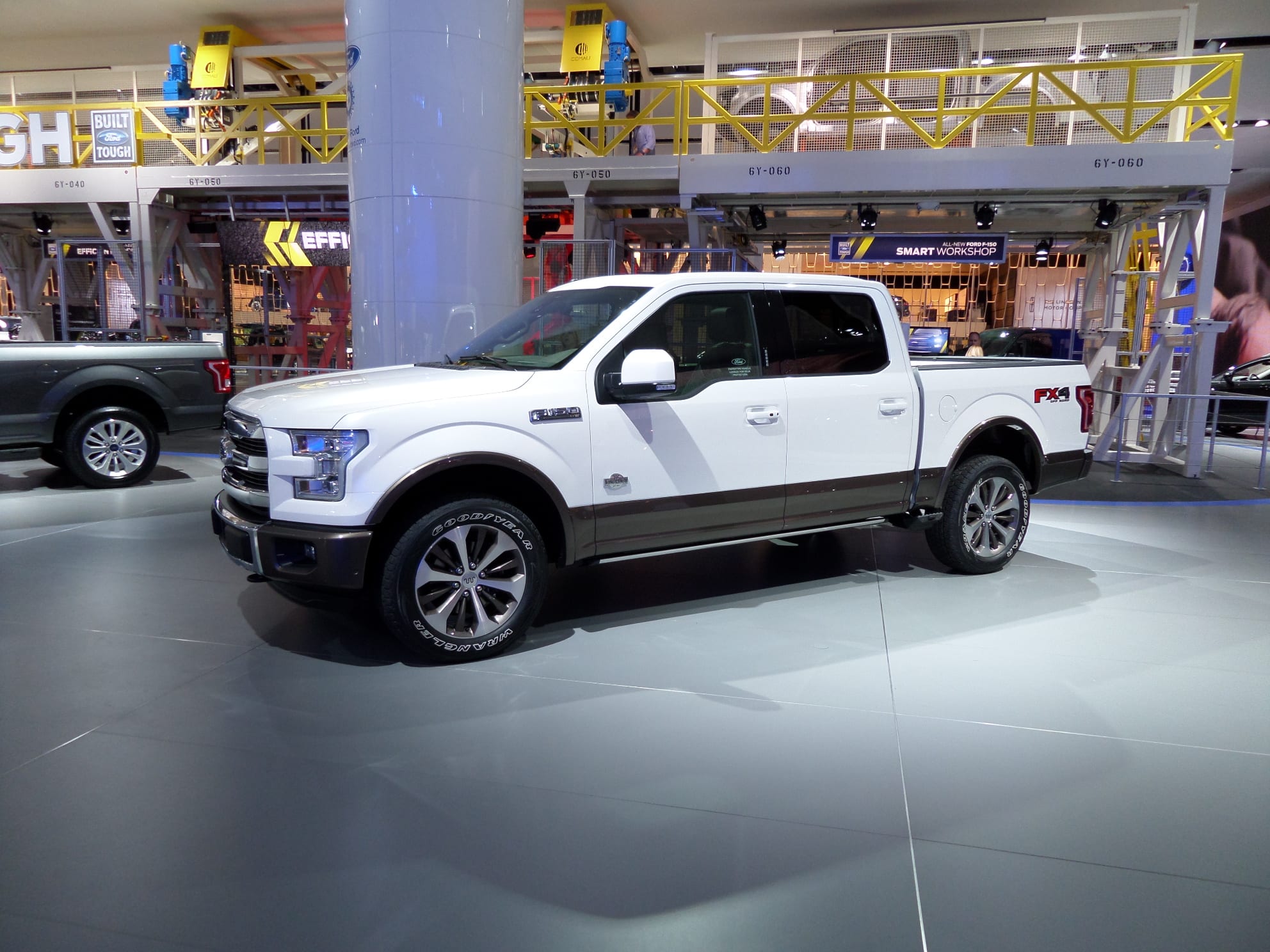 White 2015 Ford F-150 at the NAIAS. Side view.