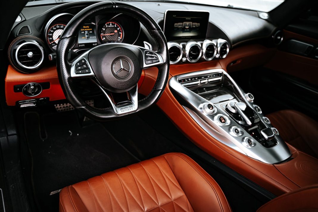 black and brown mercedes benz car interior. Mercedes cars will now have ChatGPT integration