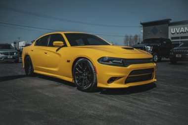 a parked yellow dodge charger